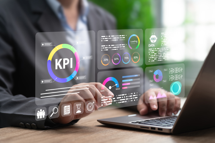 Businessman reviewing digital marketing metrics to improve strategy, productivity, decision-making, and sustainable growth.


