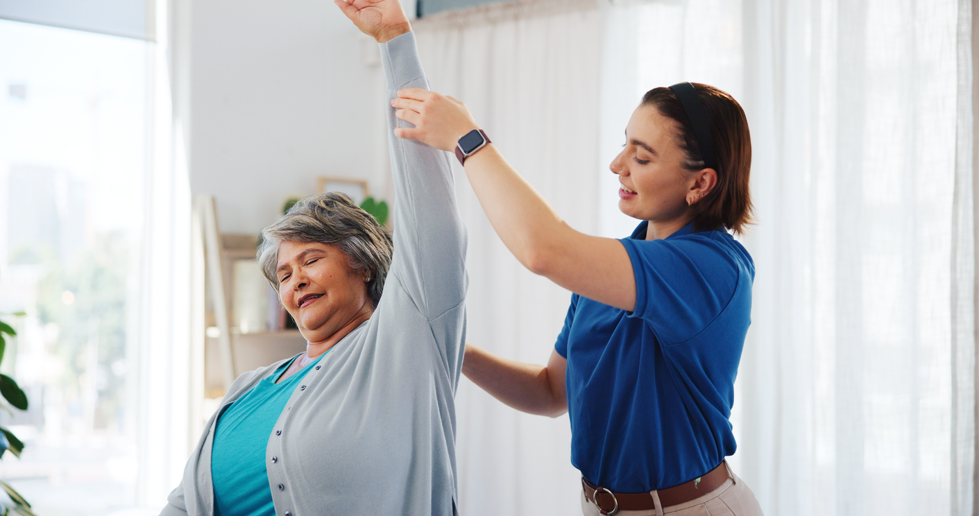 Senior woman, stretching and consultation with therapist for physical therapy, mobility exercise or rehabilitation.

