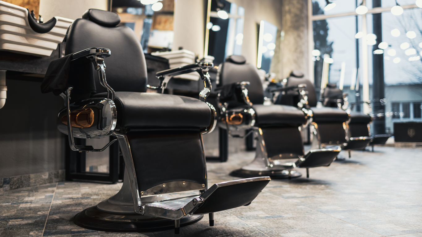 Empty chairs at barber shop.