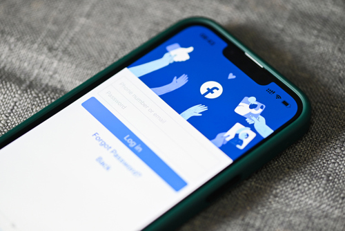 Facebook Logo on Phone