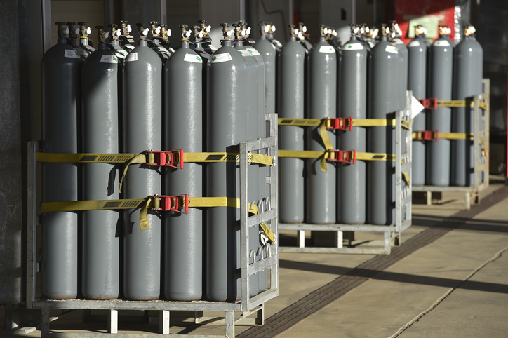 Groups of large Nitrogen gas tanks on stands.

