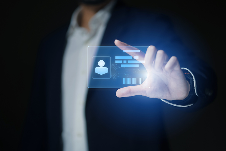 Human hand holding Digital identification card or digital ID. 