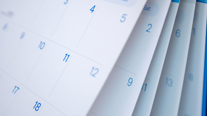Picture of a calendar with various dates. 